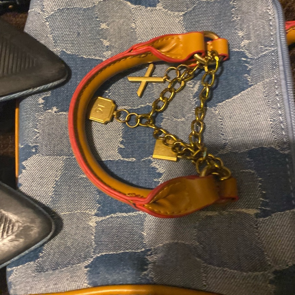 denim purse with 2 pairs of shoes gently used